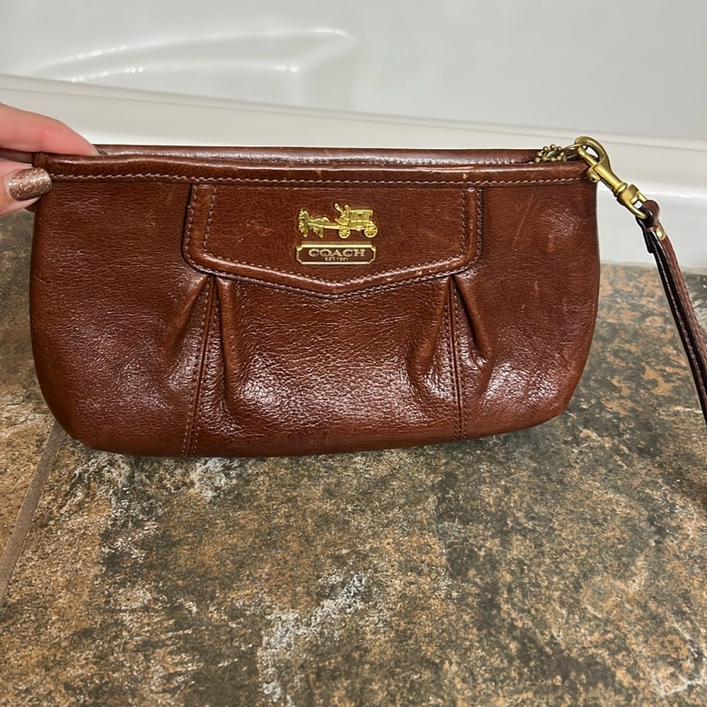 Coach Brown, leather wristlet with zipper ￼